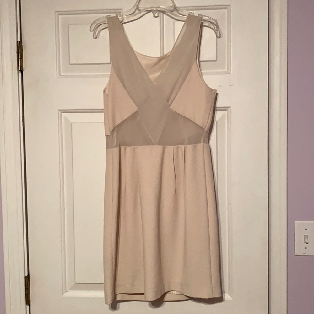 Cream dress with sheer paneling